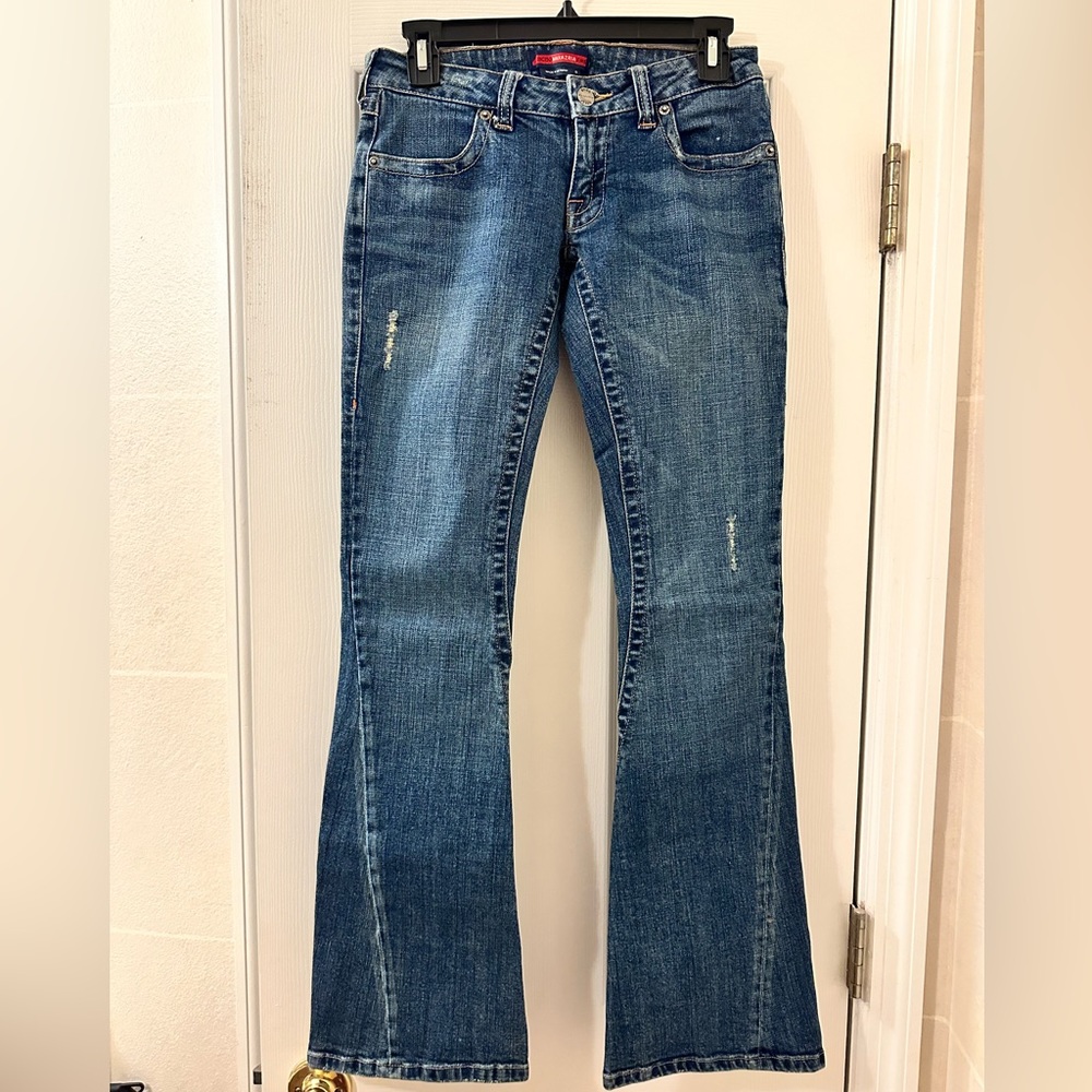 BCBG MAX AZRIA Jeans in great condition. Dark blue denim wash with flare cut.